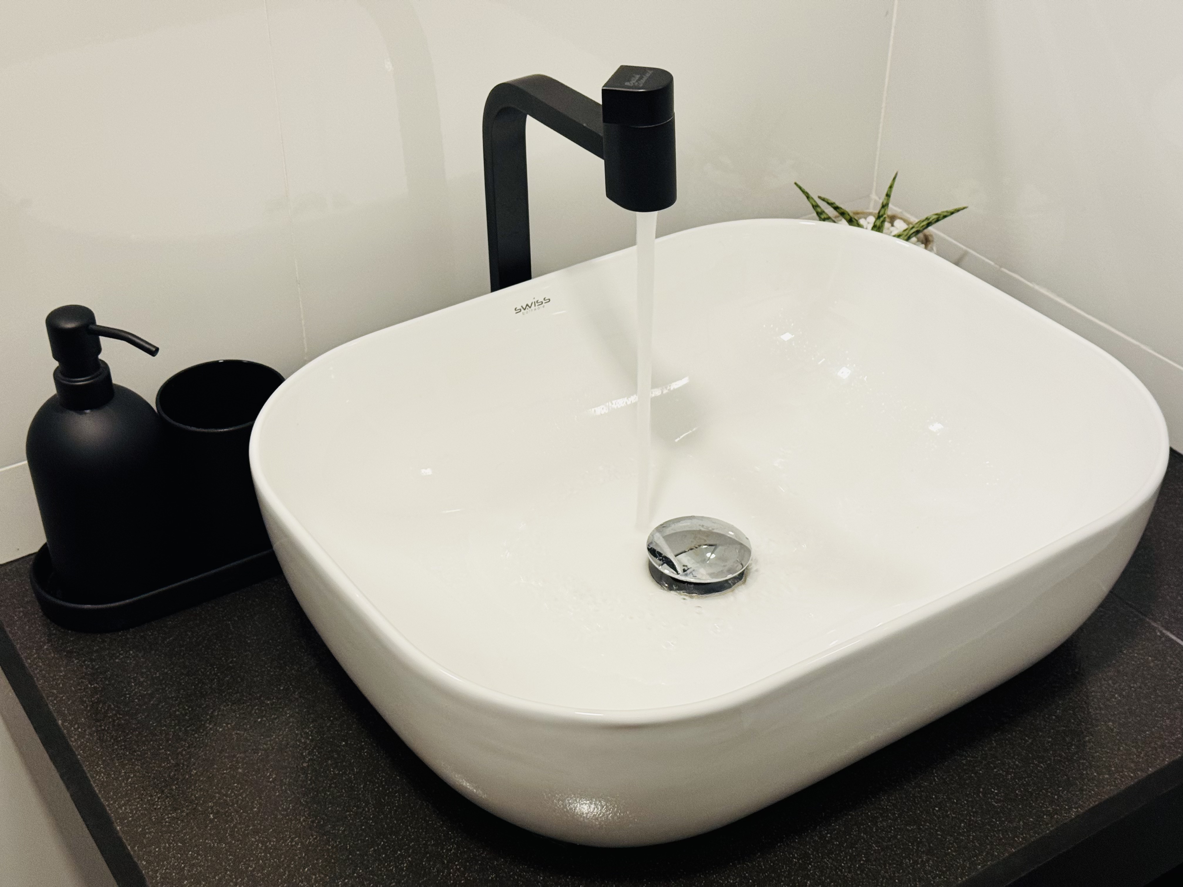 Modern spa-like bathroom with water-saving fixtures in Weligama eco-villa